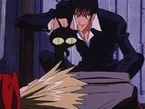 Wolfwood finds Kuroneko in his bag.