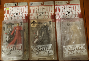 L-R: Original release Vash (no glasses), Sinister Black (no glasses), Crystal Clear (glasses)