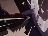 Vash's hidden knife is shattered against Kesskass' blade.