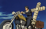 Wolfwood on his motorcycle. Early, incomplete version of scene without dust effects and different background as seen in the next episode preview.