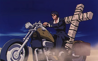 Wolfwood on his motorcycle.