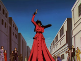 Kuroneko falls on Vash's head.